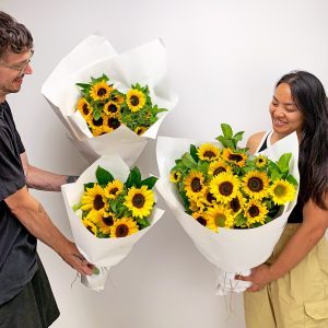 Three sizes of sunflower bouquets together - Sydney flower delivery