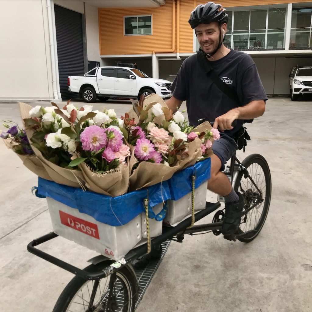 Bike courier delivering flowers in Sydney